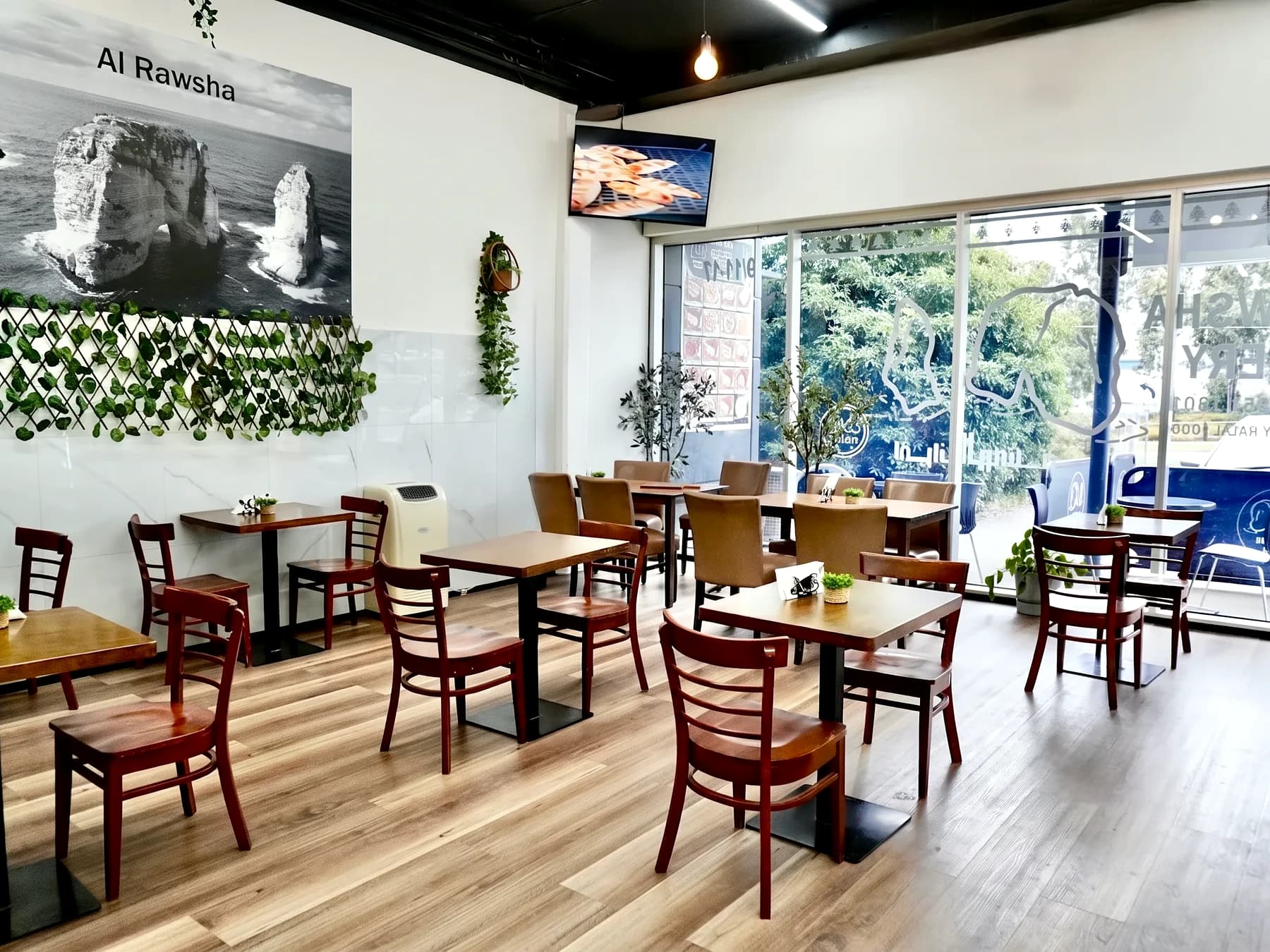 The dining room, with the Raouché rocks on the wall